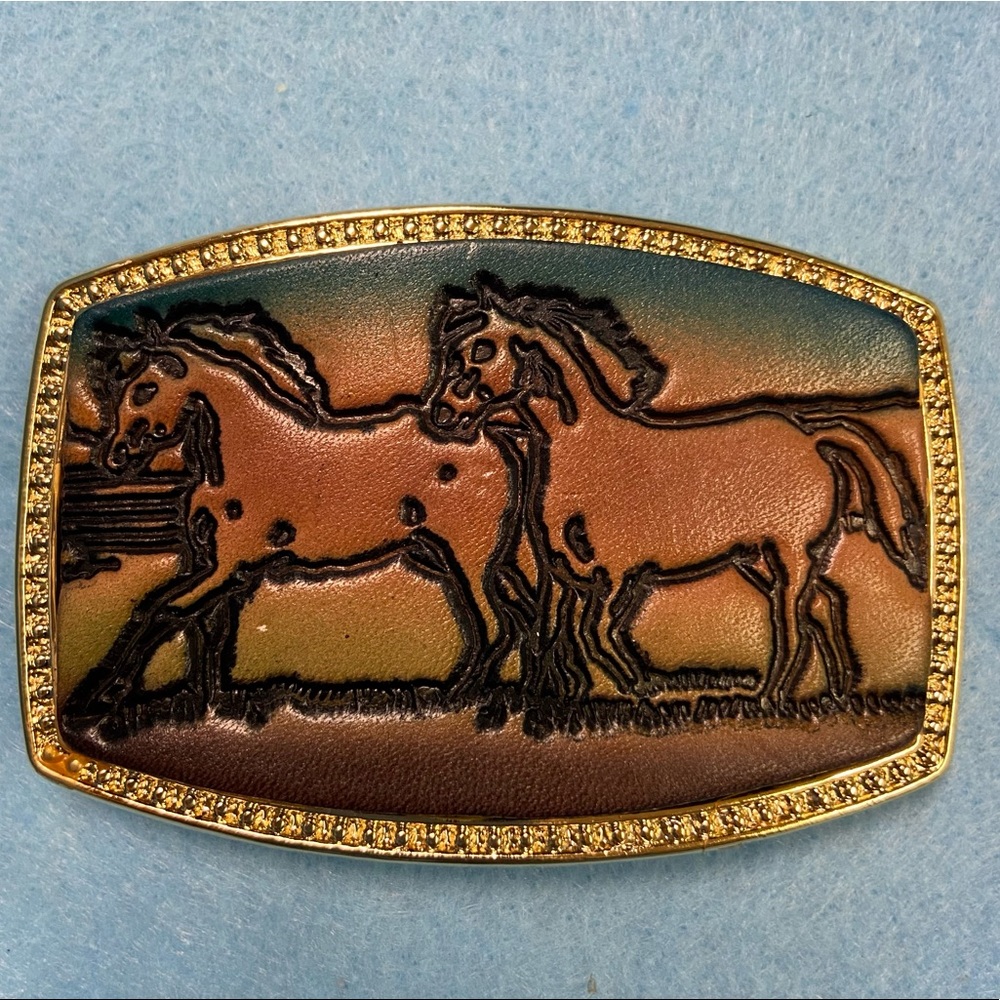 2 horses stamped and painted into Leather and attached to ALUMALINE Belt Buckle